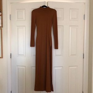 Backless long sleeved dress